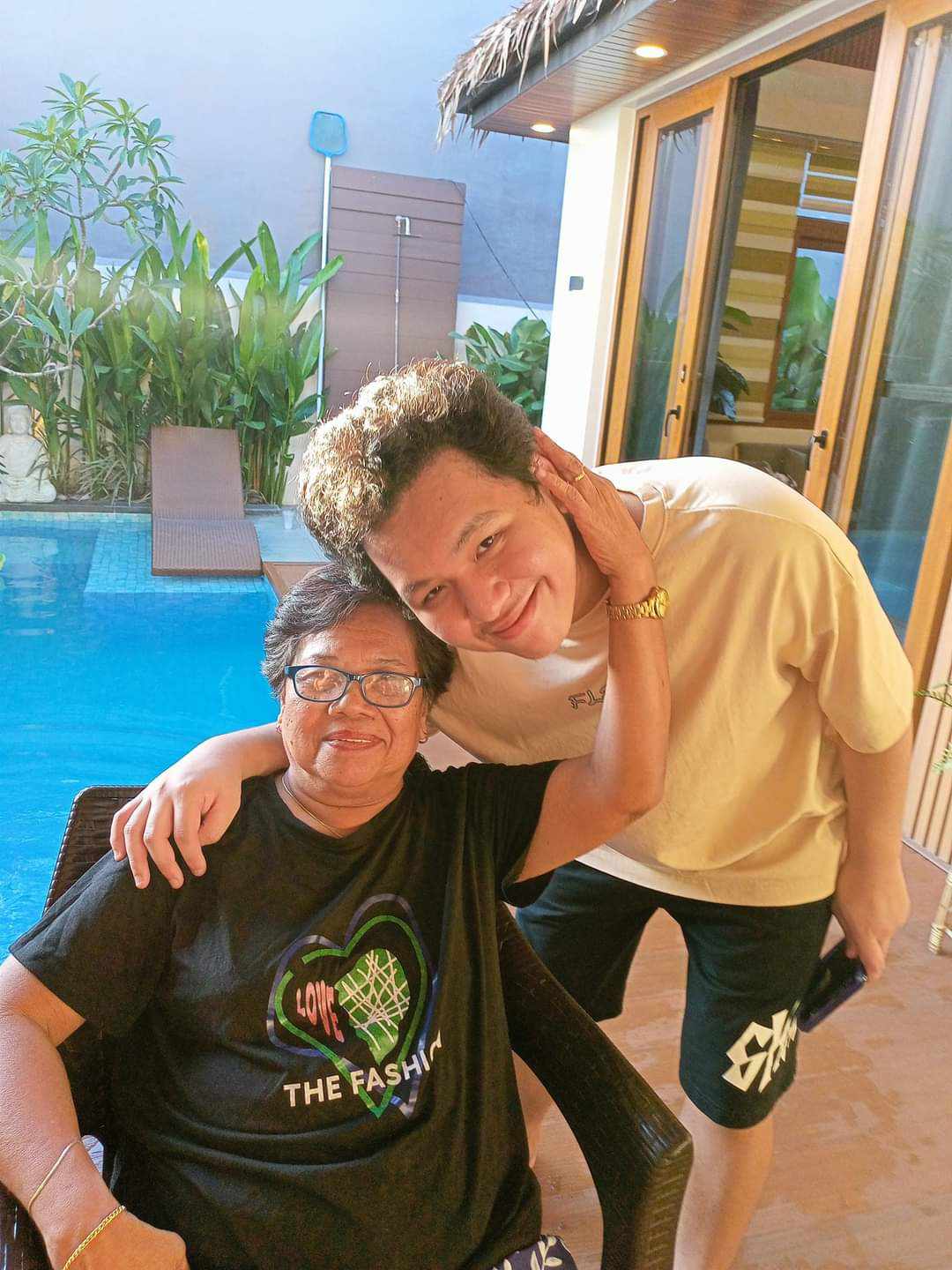 KarlTzy with his grandmother, Lola Benny