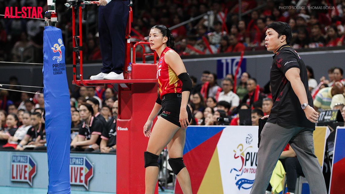 Coach Rald Ricafort of the PLDT High Speed Hitters with Kianna Dy