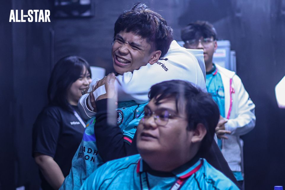 Nosia pulls MP the King into a playfull headlock. Photo: Richard Dizon Esguerra