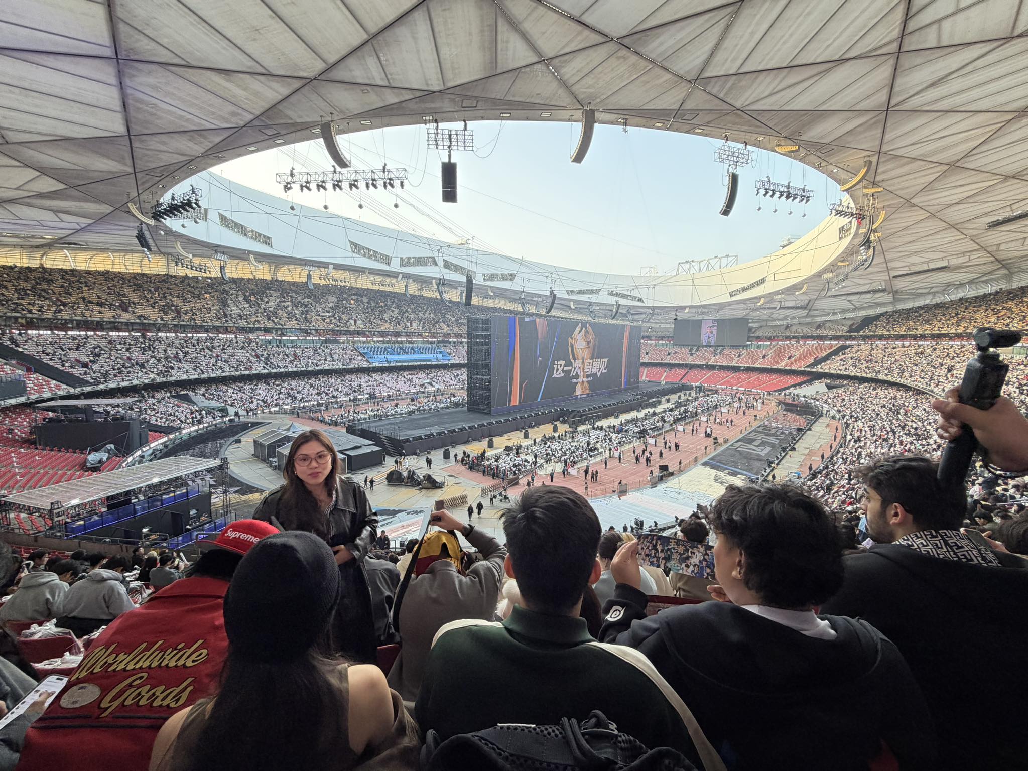 Chantelle takes a photo of Mara at the Bird's Nest