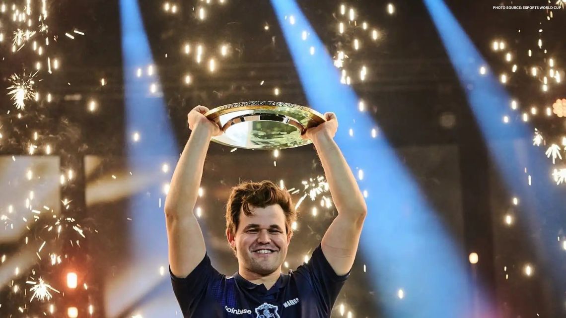 Magnus Carlsen lifts his trophy at the inaugural esports chess tournament at the Esports World Cup in Riyadh