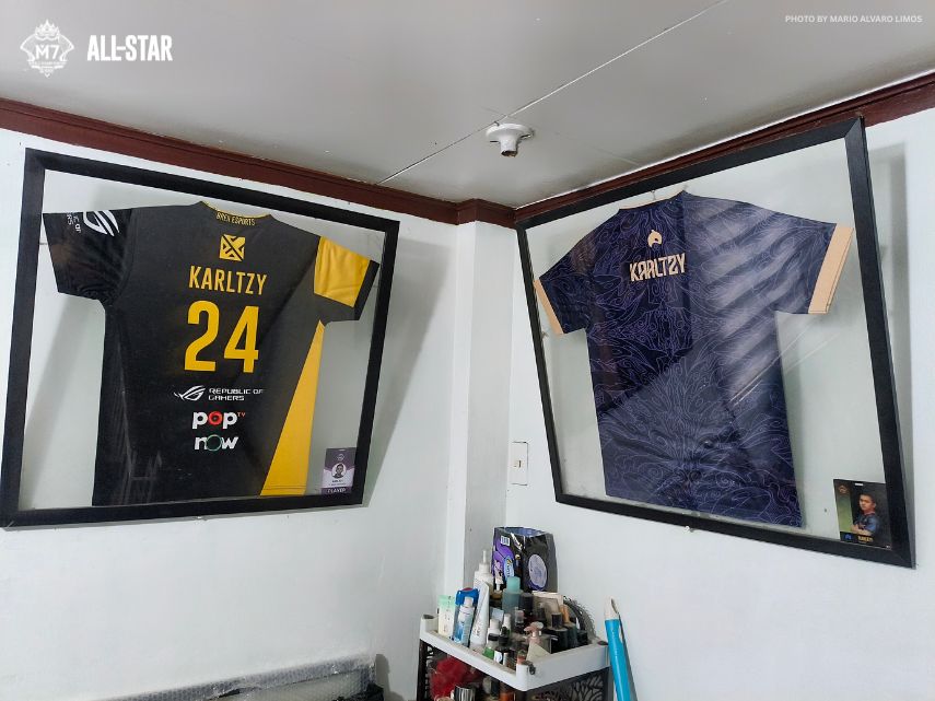 KarlTzy's winning jerseys framed at home