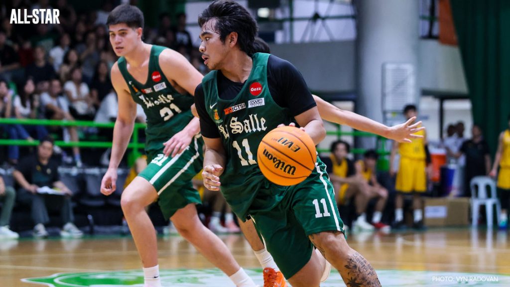 Jacob Cortez drives the ball during their NSAC Quarterfinals match against FEU