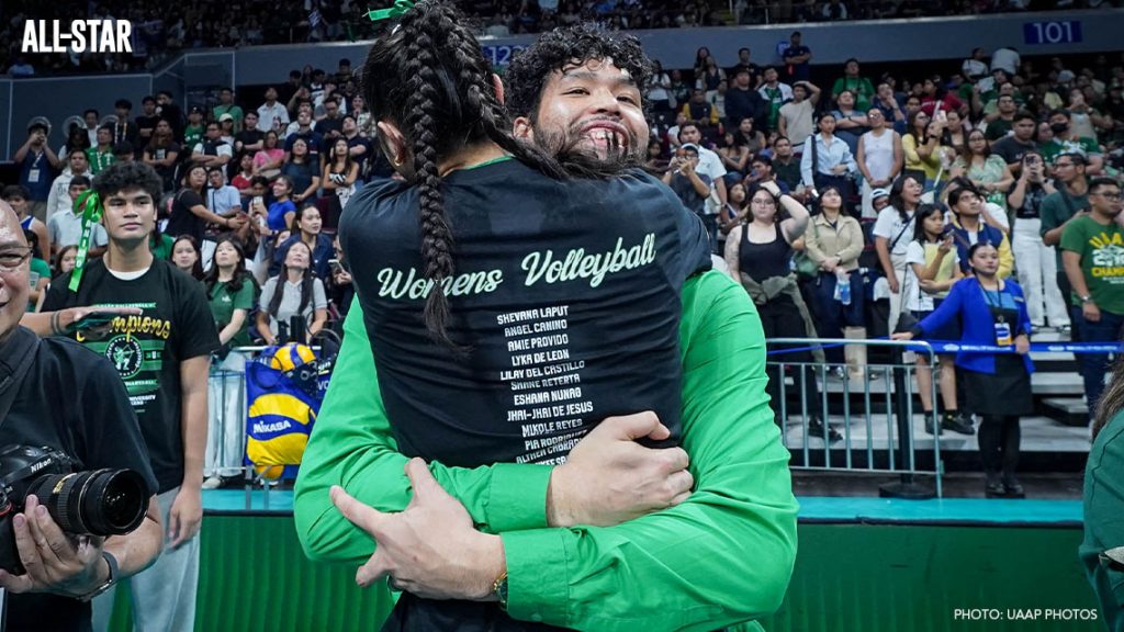 James Laput hugs his sister Shevana after DLSU wins the championship